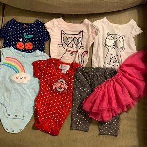 5 onesies, 1 pants, 1 skirt